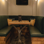 A booth at Boulevardier