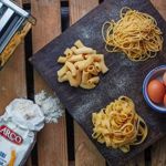A table full of food at Nonnas Restaurant.