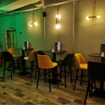 Tables and chairs at Boulevardier