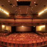 A view of the Montgomery theatre, from the back, looking across the seating, towards the stage.