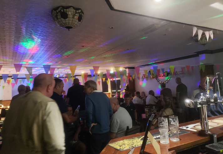 The Centre Spot at night filled with customers.