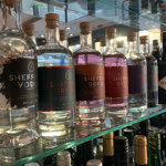 A shelf full of bottles of spirits at Turnip & Thyme.