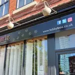 The exterior of Tabby Teas Cat Cafe.