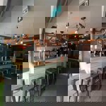 Stools round a bar at Butcher & Catch.