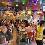 Tables filled with customers at Zaap Thai Street Food.